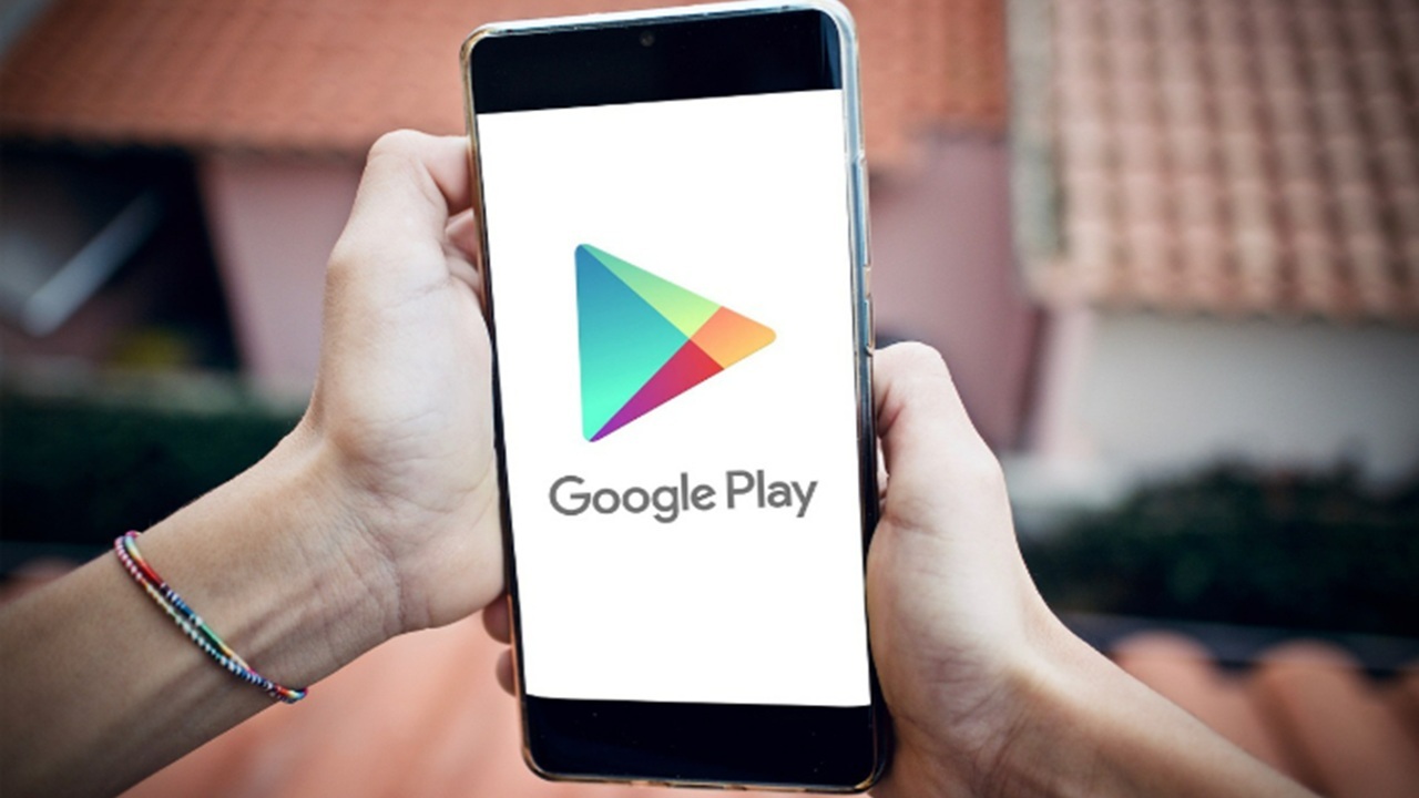Play Store logo on phone.
