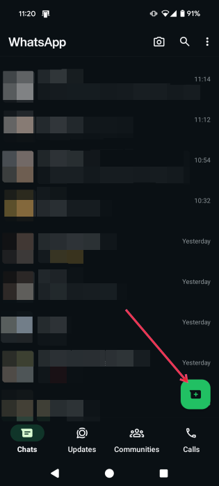 Pressing the new chat button in WhatsApp on Android. 