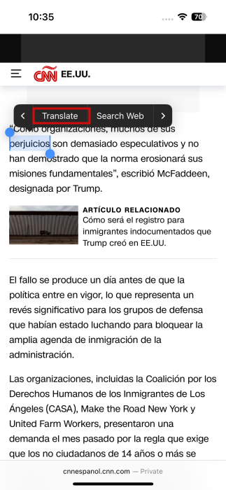 Tapping on the "Translate" option in Safari for foreign word on iPhone. 