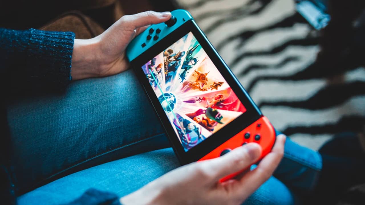 Person playing Nintendo Switch.