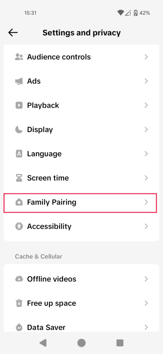 Tapping on "Family Pairing" option in TikTok app. 