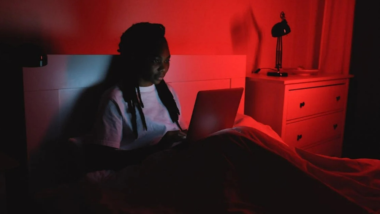 Woman reviewing information on her laptop.