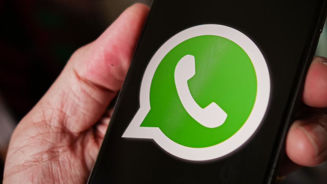 WhatsApp logo on phone.