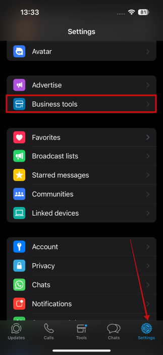 Tapping on "Business Tools" in WhatsApp Business settings.