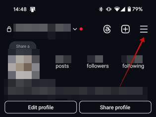 Pressing on hamburger menu on Instagram profile on mobile. 