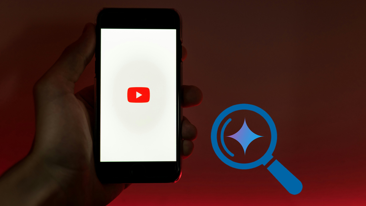 hand holding a phone with YouTube icon in middle and search icon on right
