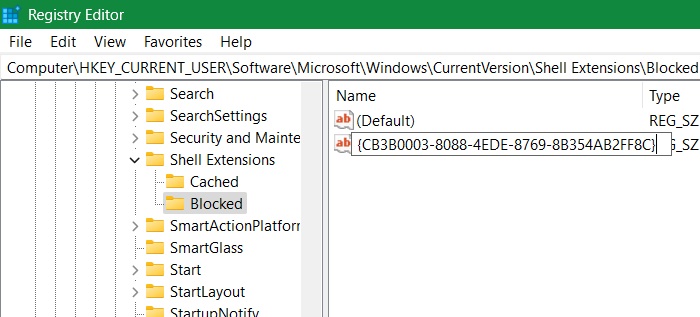 Creating a new string value under Shell Extensions -> Blocked in Registry Editor.
