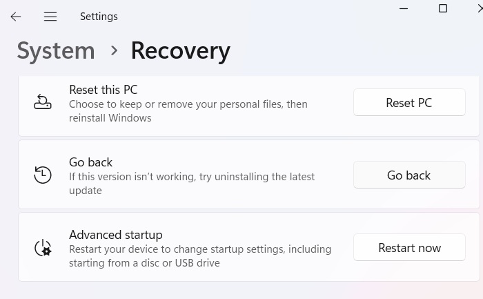 Using "Go back" under System Recovery in Windows 11.