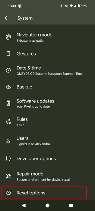 Tapping on "Reset options" in Android System settings. 