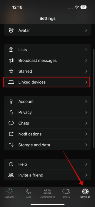 Selecting "Linked devices" option in WhatsApp on iPhone. 