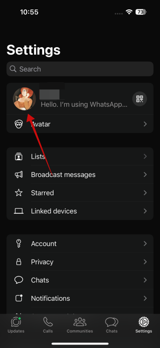 Tapping on profile picture in WhatsApp settings on iPhone.