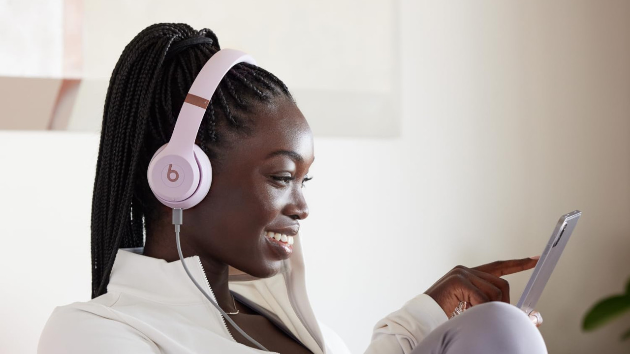 Woman Listening to Music With Beats Audio Headphones