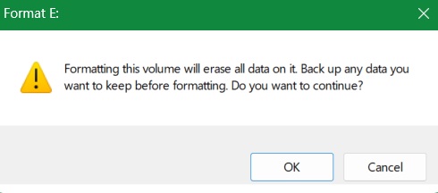 Warning window in Disk Management while formatting a USB drive volume.