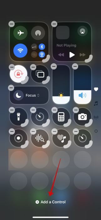 Tapping on "Add a control" option in Control Center on iPhone. 