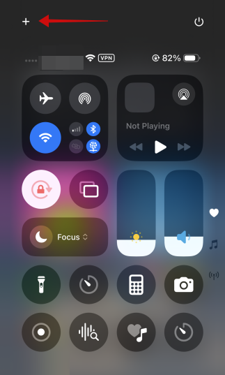 Tapping on + button in Control Center on iPhone. 