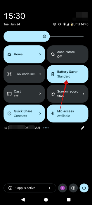 Tapping on "Battery Saver" tile in Android Quick Settings.
