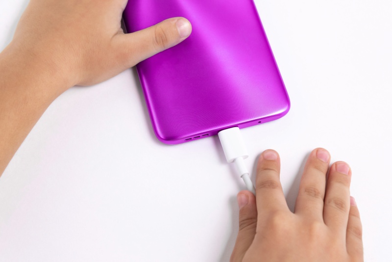 Charging phone via USB Type-C port.