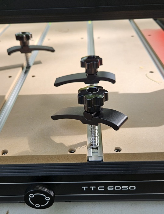 Clamps included with router.