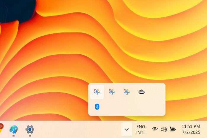 Snipping Lens is saved to the System Tray