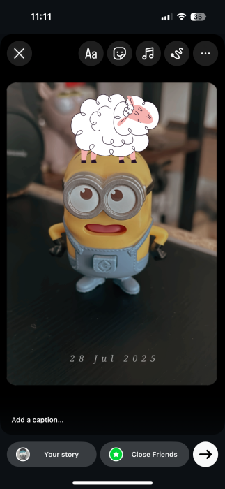 Adding previously downloaded sticker on Instagram story on iPhone.