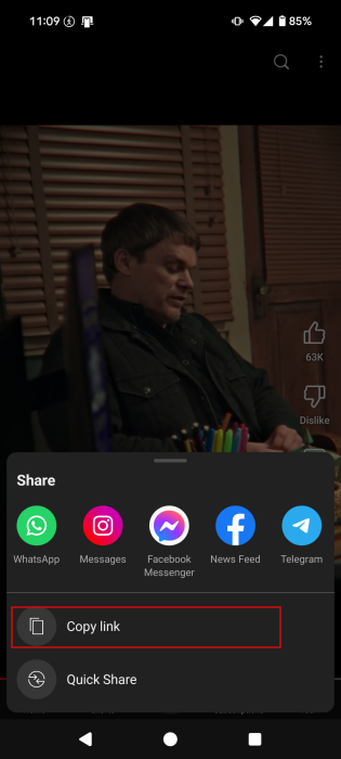Tapping "Copy link" option for Short in YouTube app on mobile.