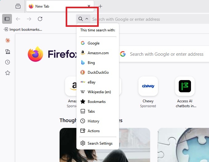 Selecting a search engine from the Firefox address bar.