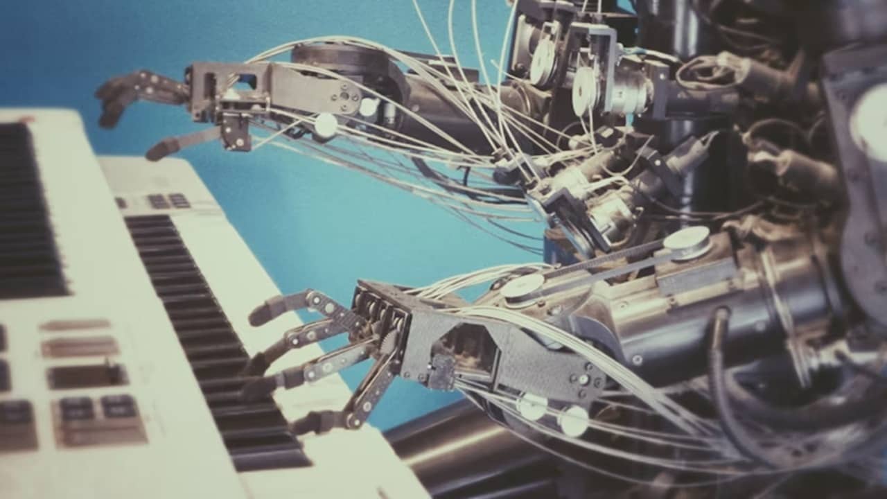 Robot playing piano.