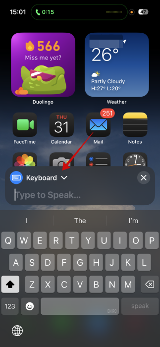 Tapping arrow icon in Live Speech UI on iPhone. 