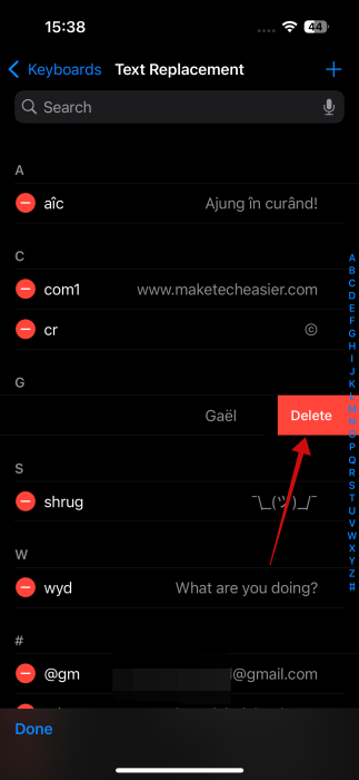 Tapping "Delete" button for text shortcut on iPhone.