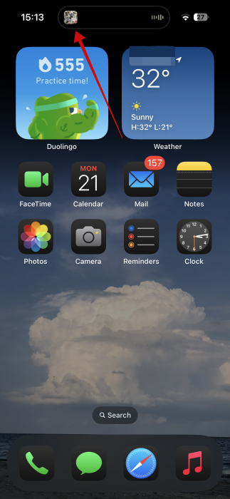 Music playing view in Dynamic Island on iPhone. 