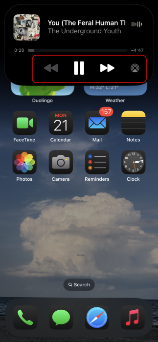 Music controls visible via Dynamic Island on iPhone. 