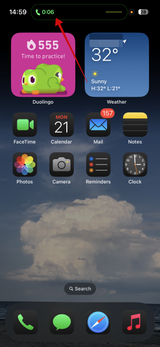 Dynamic Island showing that call is in progress on iPhone. 