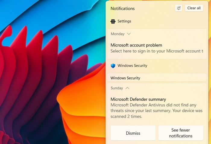 Using a four-finger gesture on touchpad to open Settings and Notifications Center.
