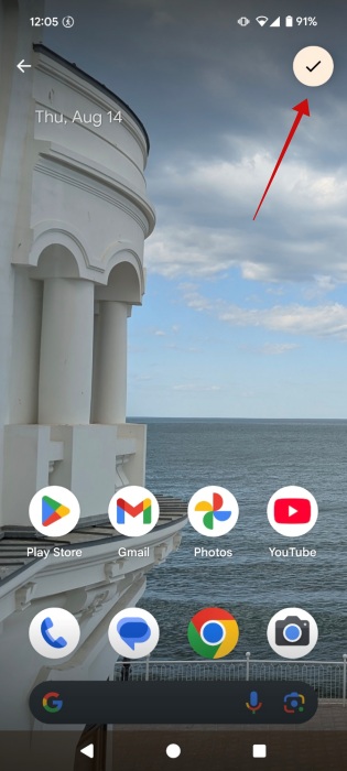 Tapping "OK" button after positioning wallpaper on Android homescreen. 