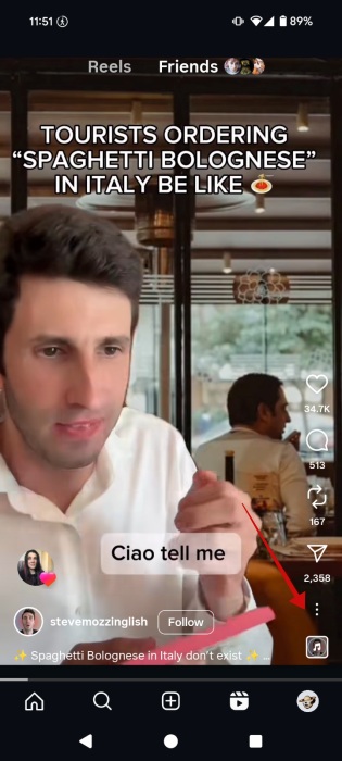 Tapping three dots option in Reel viewing screen on Instagram. 