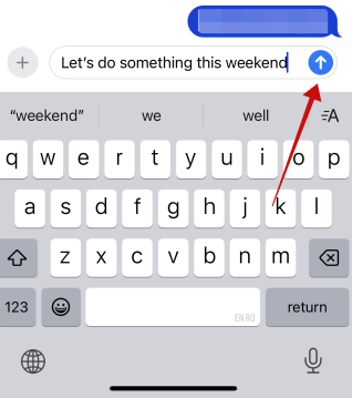 Long pressing on Send button in Messages app on iPhone.