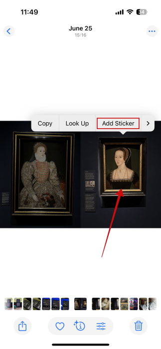 Tapping on "Add Sticker" button on image in Photos app on iOS.