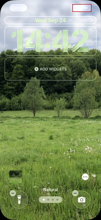 Saving new Liquid Glass-style clock for lock screen on iPhone.
