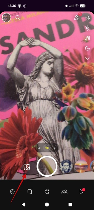 Tapping the Memories icon in Snapchat app.