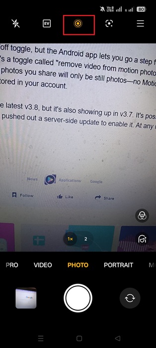 "Live Photos" yellow icon on top of Oppo phone camera under PHOTO setting.