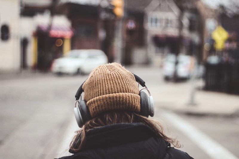 Listening to music on the street.