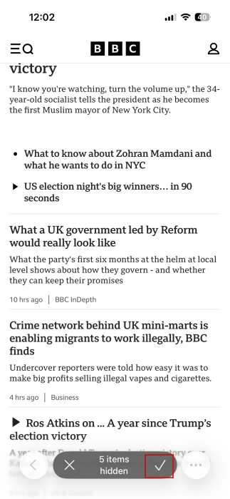 Tapping on check mark button to hide all elements on Safari on iPhone.