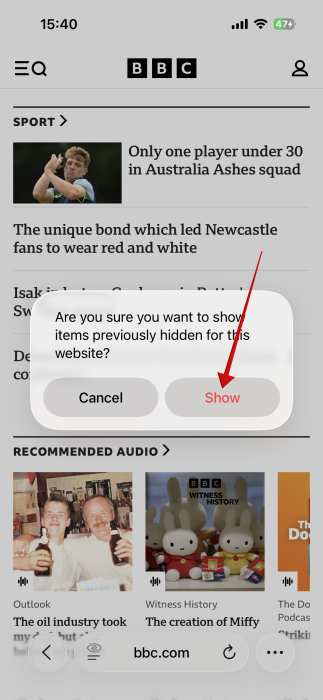 Tapping "Show" in pop-up in Safari on iPhone.