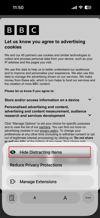 Selecting to "Hide Distracting Items" in Safari on iPhone.