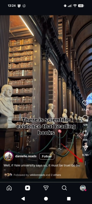 Tapping on three-dot menu in Instagram Reel.