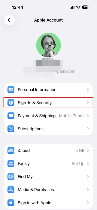 Opting for "Sign-in & Security" option in Apple Account settings on iPhone.