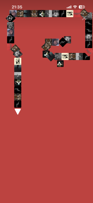 Snake game in progress via Spotify app.