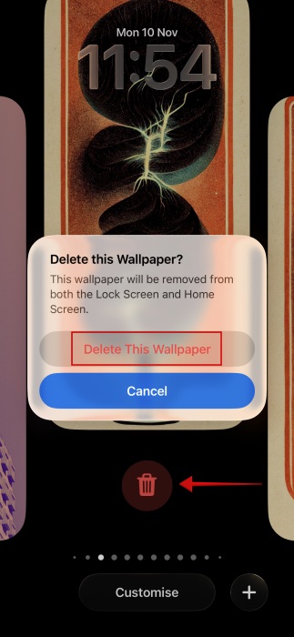 Tapping on "Delete This Wallpaper" option to remove older wallpaper from iPhone. 