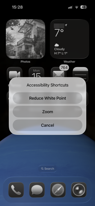 Selecting Accessibility shortcut by triple-pressing power button on iPhone.