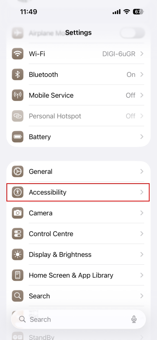 Selecting "Accessibility" option in iPhone Settings. 